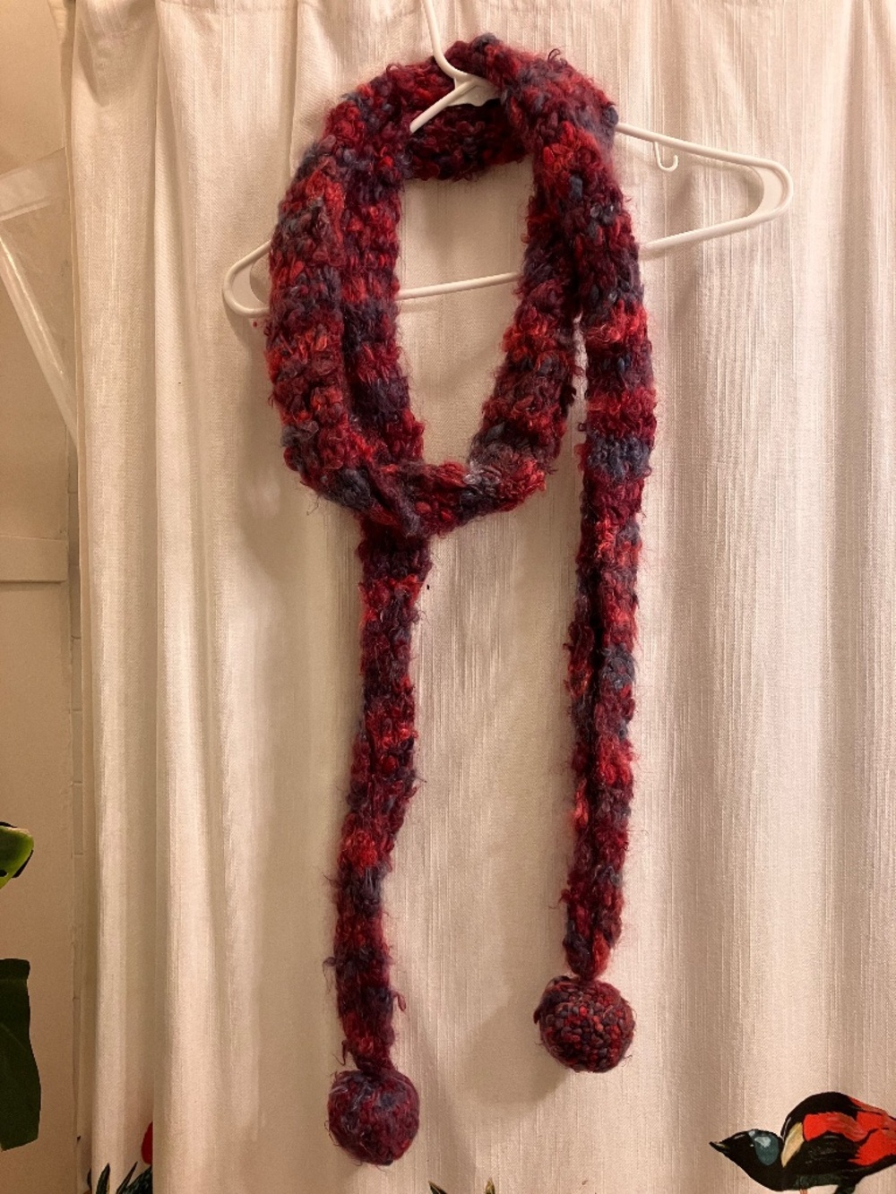 Hand-made pink crochet skinny neck-scarf with big pom-poms